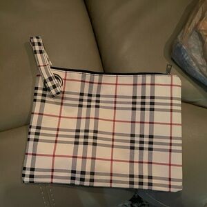 Black, white and red zippered pouch with wristlet. New, w/o tags